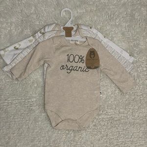 Baby neutral colored 3 piece long sleeve bodysuits